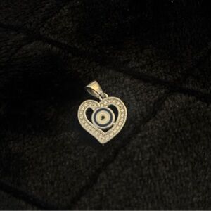 Silver Heart Pendant with Evil Eye Design